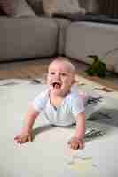 Free photo close up on baby crawling and learning to walk