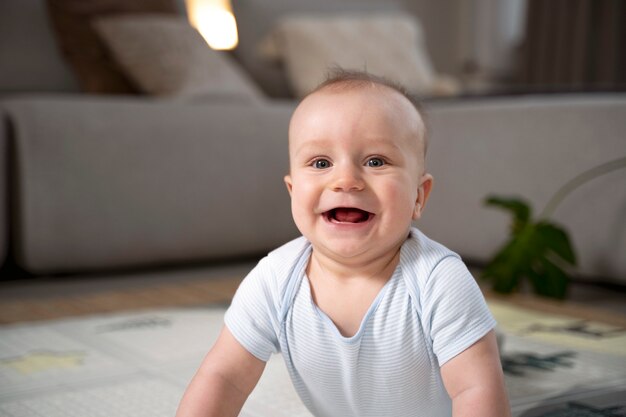 Close up on baby crawling and learning to walk