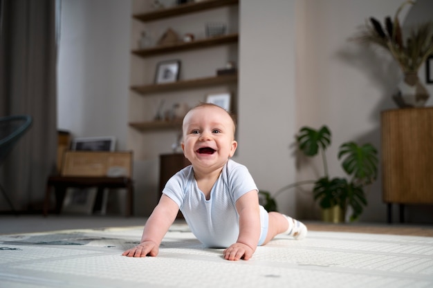 Close up on baby crawling and learning to walk