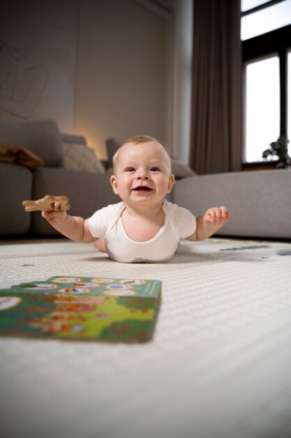 Close up on baby crawling and learning to walk