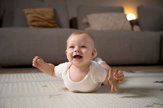 Close up on baby crawling and learning to walk