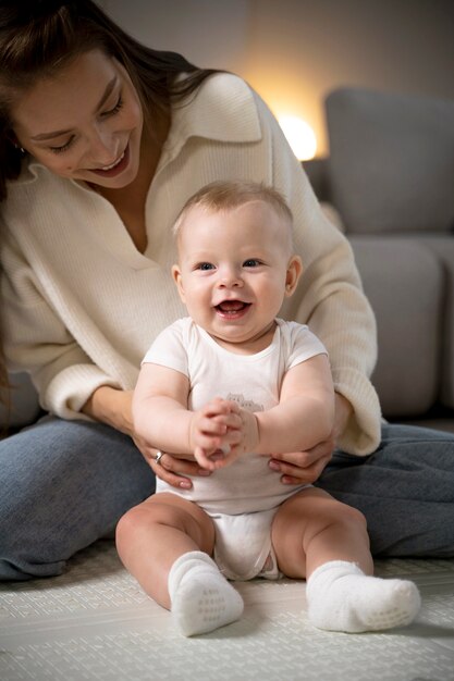 Close up on baby crawling and learning to walk