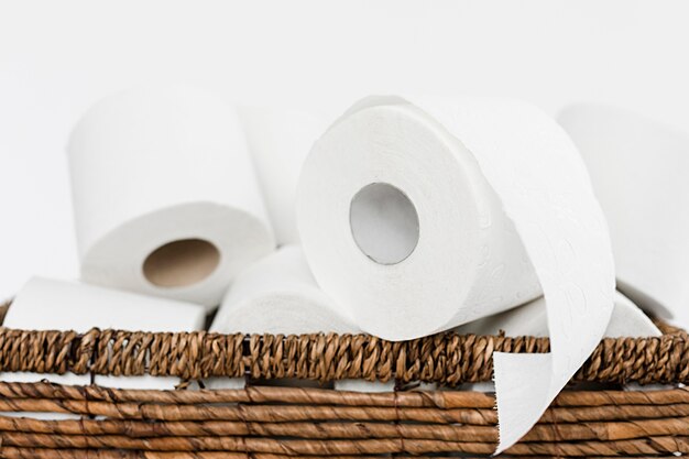 Close-up backet with toilet paper rolls