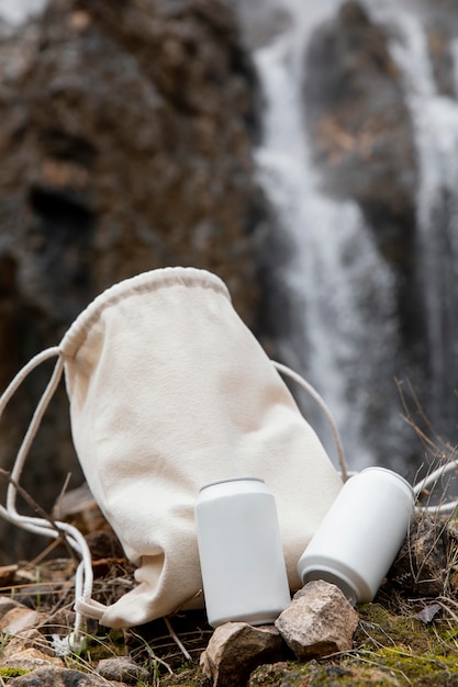 Close up backpack and can in nature