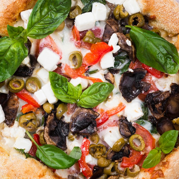 Close-up baked pizza with vegetables