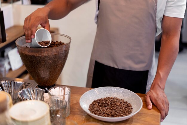 Close up barista preparing coffee