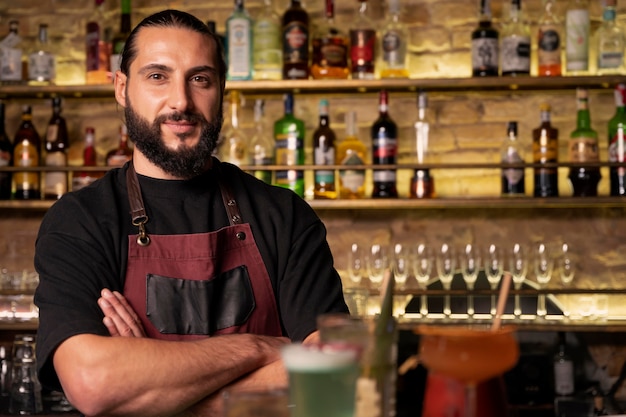 Free photo close up on bartender and cocktail shaker