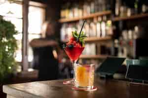 Free photo close up on bartender creating delicious drink