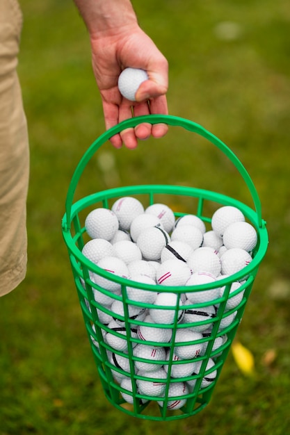 Close-up basket filled with golf balls