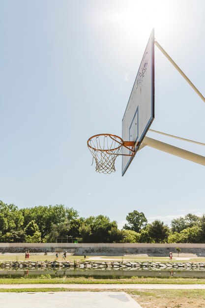 Close-up of basketball hoop on sunny day