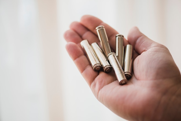 Close-up of battery cells in hand