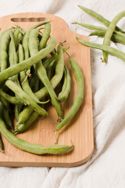 Close-up of beans on chopping board