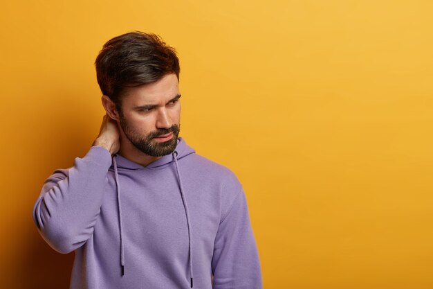 Close up on bearded young man isolated