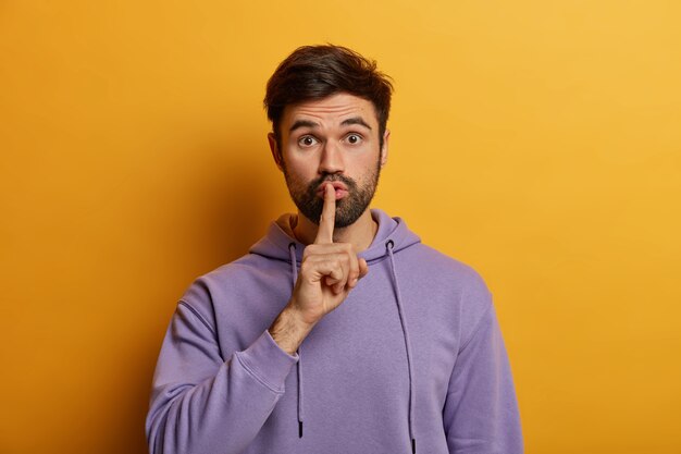 Close up on bearded young man isolated