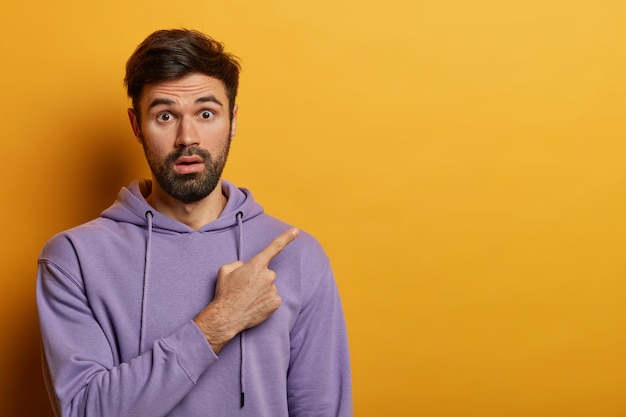 Free photo close up on bearded young man isolated