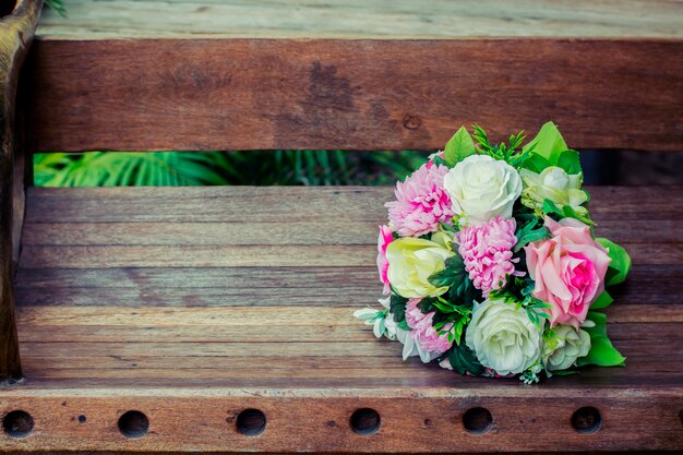 Close-up of beautiful bouquet on a wooden bench