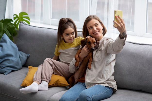 Free photo close up on beautiful dachshund spending time with family