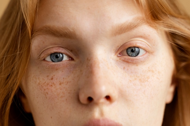 Close up beautiful woman with freckles