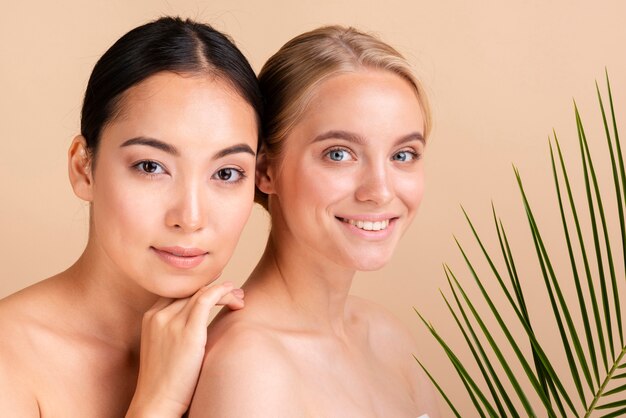 Close-up beautiful women posing with leaves