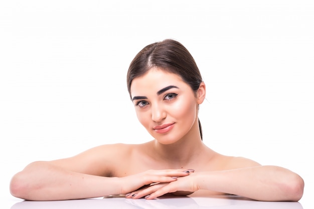 Close up beauty portrait of a beautiful half naked woman looking away isolated