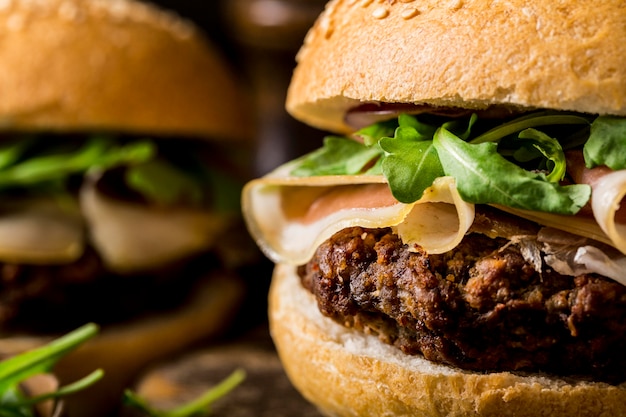 Close-up beef burger with bacon