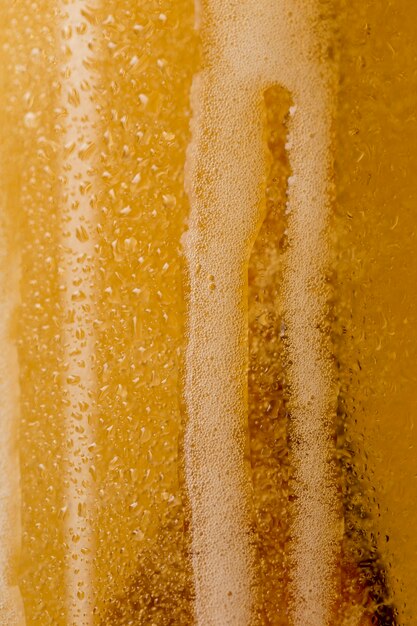 Close-up beer with foam on the glass