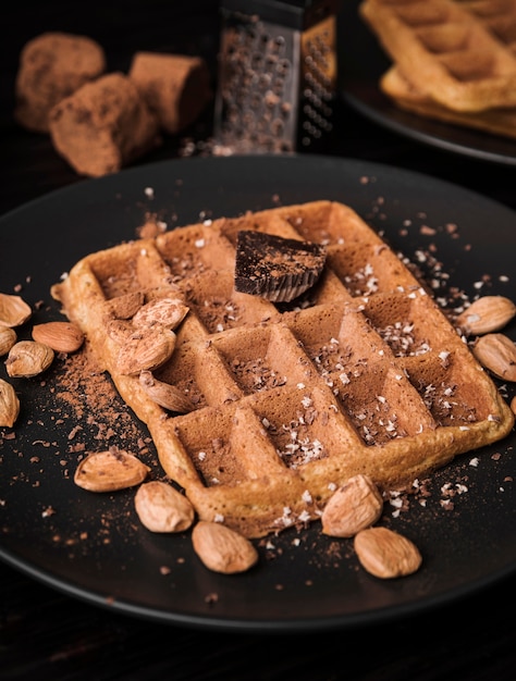 Close-up belgian waffle with almonds