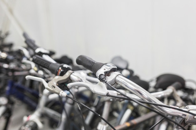 Free photo close-up of bicycle handlebar in shop