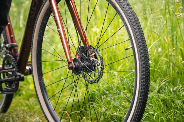 close up bicycle wheel in the grass