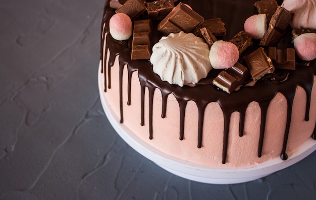 Close up of biscuit cake with chocolate drips