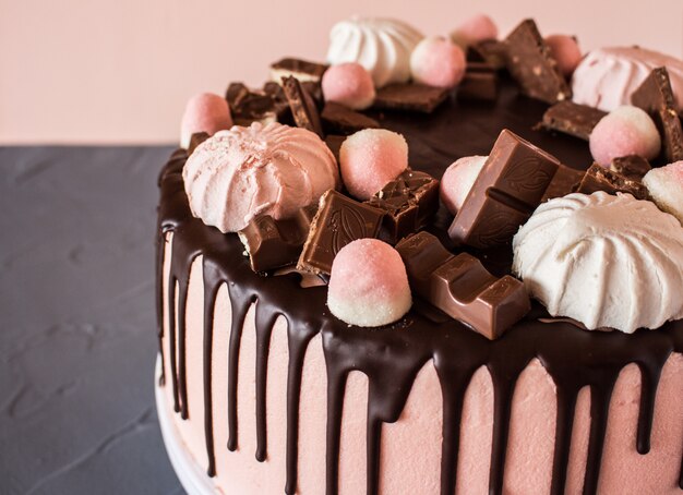 Close up of biscuit cake with chocolate drips