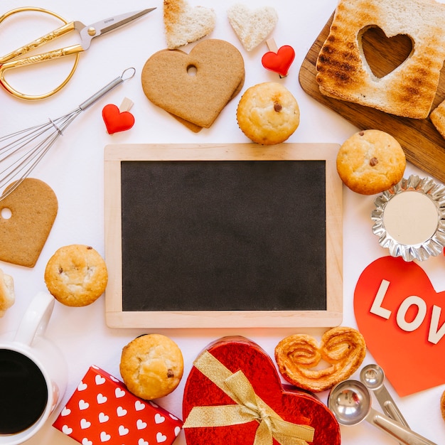 Close-up blackboard amidst pastry