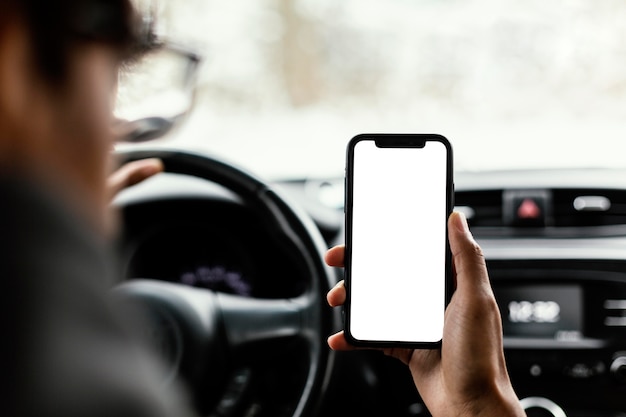 Close up blank screen mobile in car