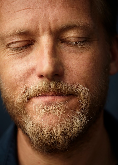 close-up of blond man posing relaxed