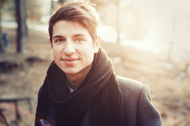 Free photo close-up of blond man with black scarf