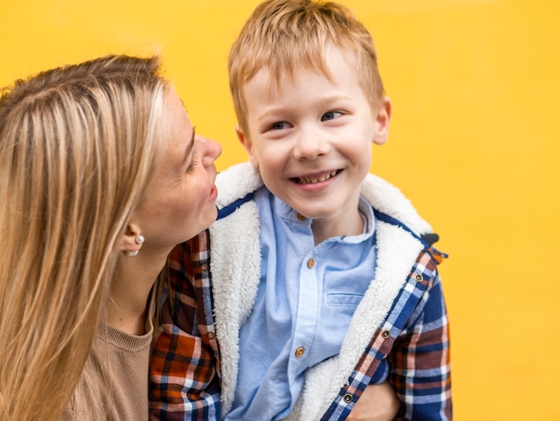 Close-up blonde mother and young boy together