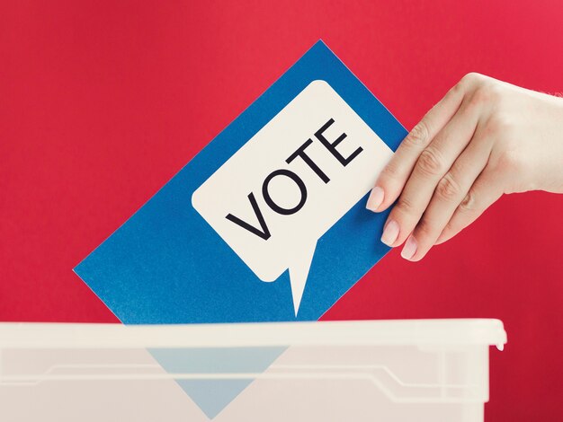 Close-up blue card with voting speech bubble in box