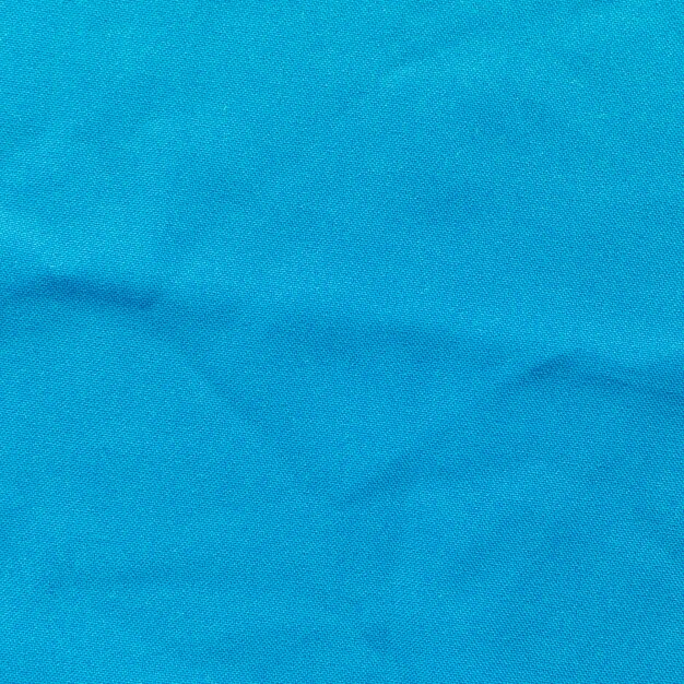 Close-up of blue cloth textured background