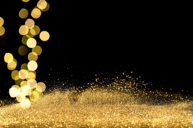 Close up of bokeh lights with golden glitter