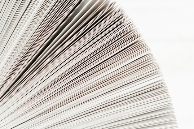 Close-up of book paper with white background