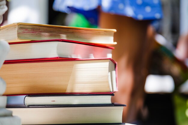 Close-up of books in sunlight