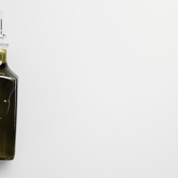 Макро бутылка оливкового масла с копией пространства