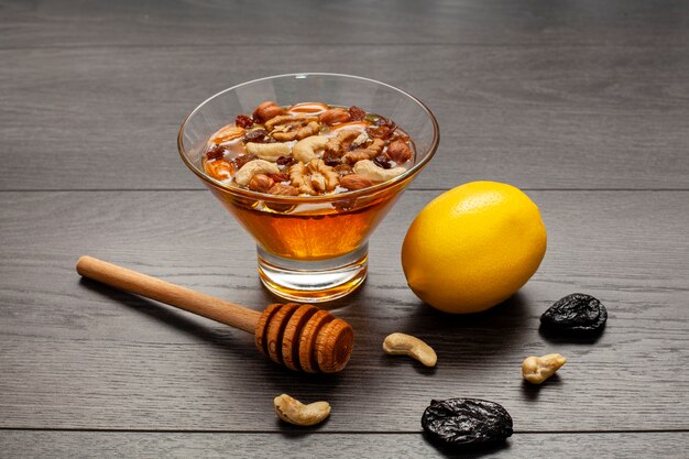 Close-up bowl filled with honey and nuts