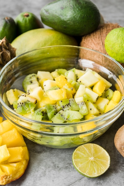 Free photo close-up bowl with exotic fruits on the table