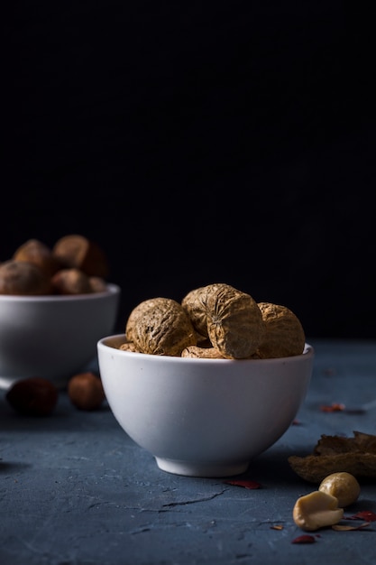 Close-up bowl with tasty walnuts