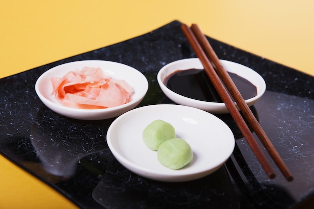 Free photo close-up bowls with condiments