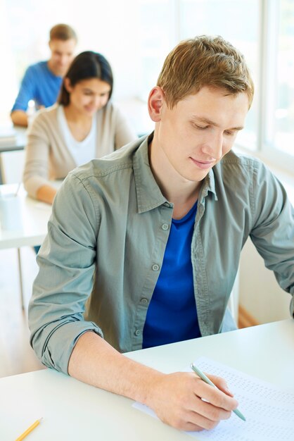 Close-up boy in an exam