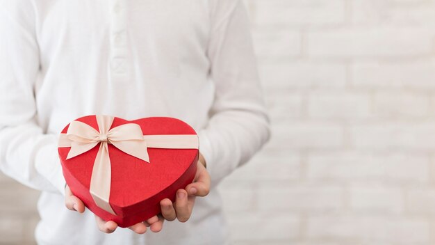 Close-up boy holding chocolate box