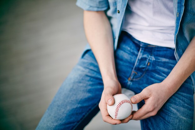 Close-up of boy with baseball