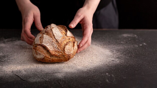 Close-up bread with stucco table